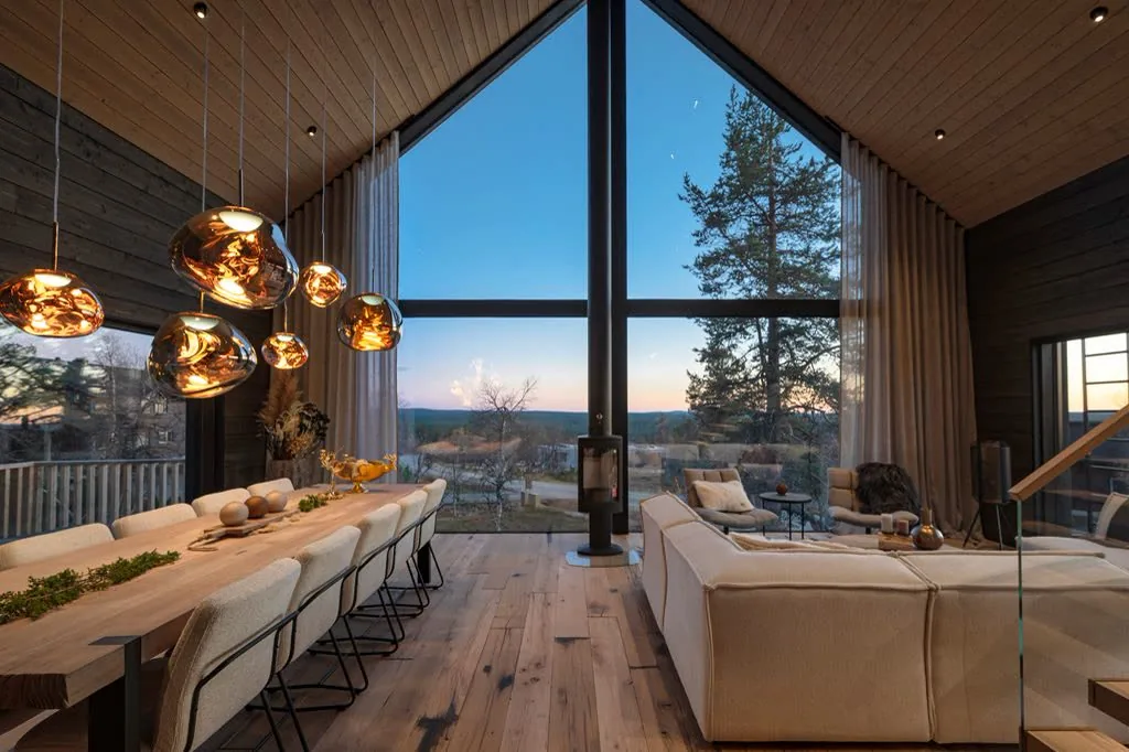 Grand Panoramic living and dining area with an open autumn view over the fells