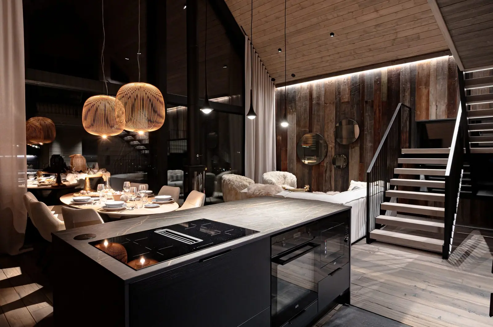 Open kitchen and dining table of Grand Hideaway at night