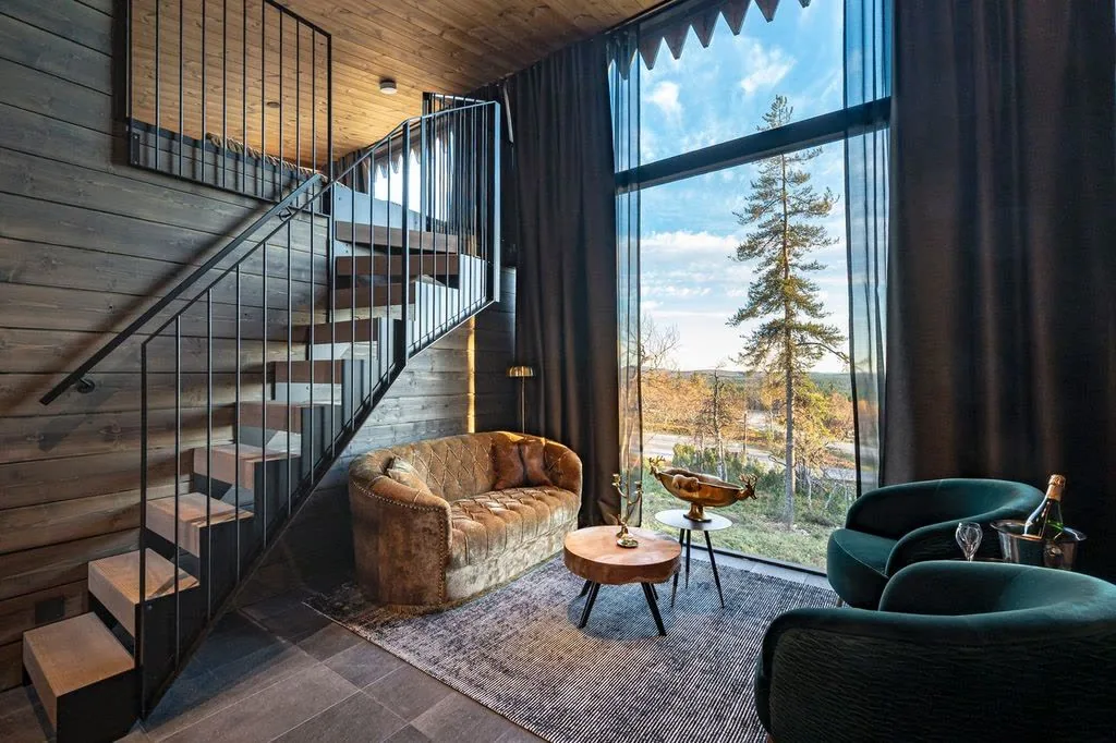 Spa lounge loft with velvet chairs and a tall window